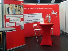 Schmuckgrafik: Messestand